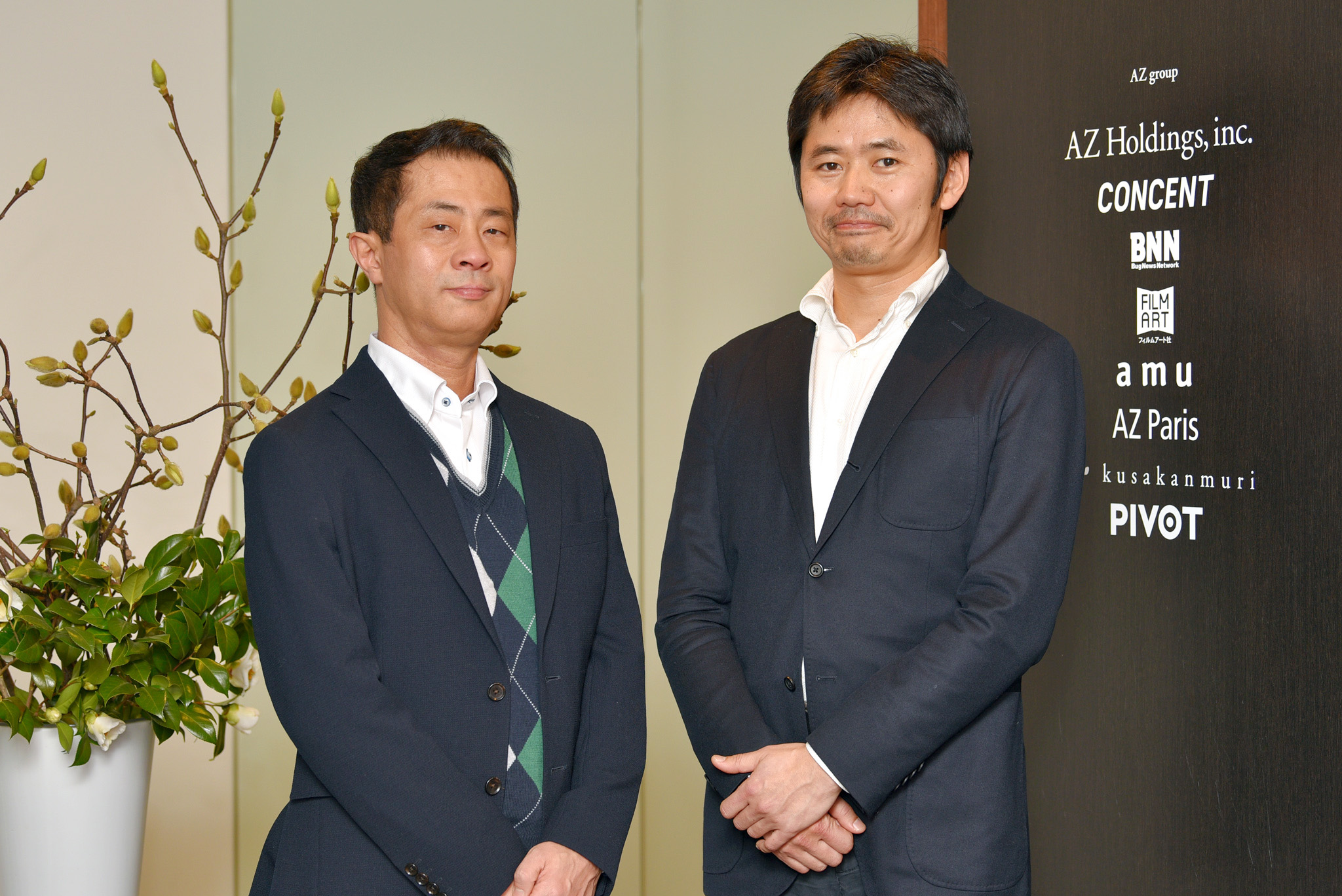 写真:コンセント 代表取締役社長の長谷川敦士と株式会社インフォアクシア 代表取締役の植木真氏