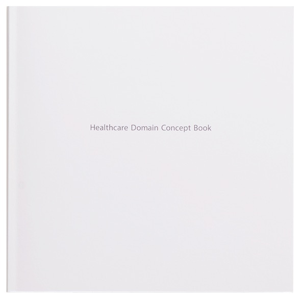 写真（6枚中6枚目）：制作した 冊子 の表紙。Healthcare Domain Concept Bookと小さく品良く入っている。