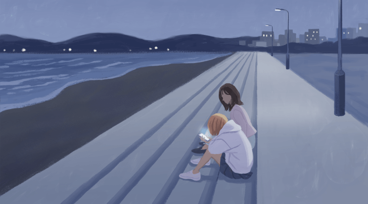動画の一部。夜明け前の海岸で、2人の女性が座って話している。