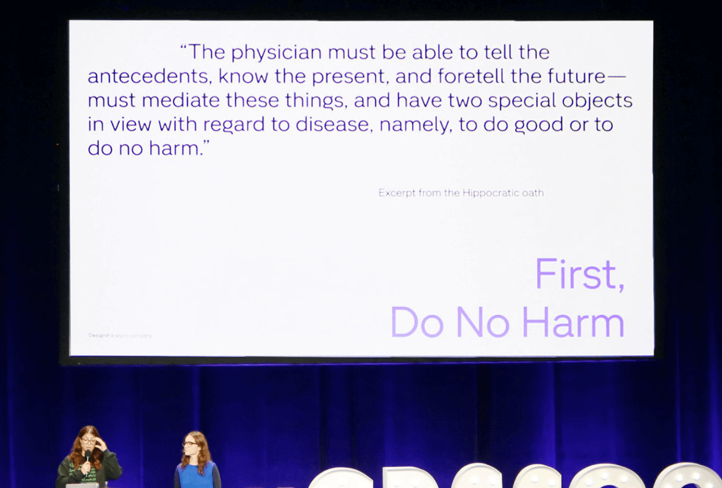 画像:Giulia Bazoli 氏と Pardis Shafafi 氏のキーノート中のスライド “First, Do No Harm.”