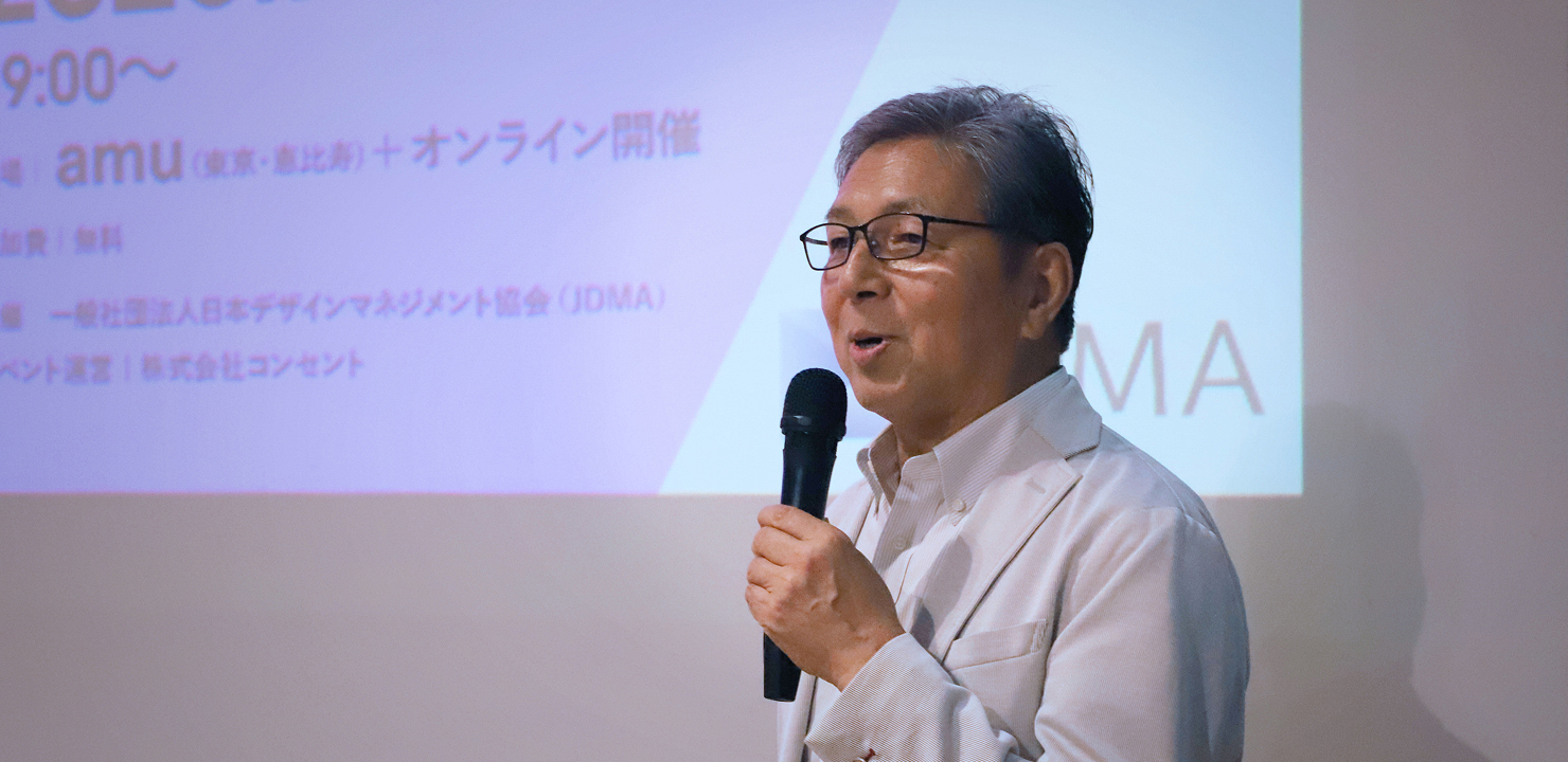写真:笑顔でマイクを握り、会場に語りかける玉田氏。