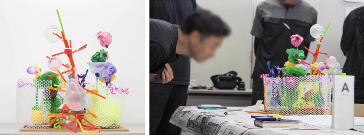 写真。ワークでつくられた架空の植物園と、植物園を見る参加者の様子。