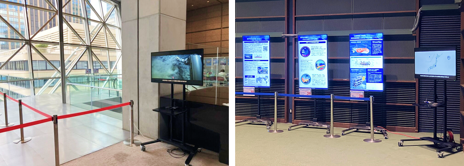 会場内の写真。会場に設置された複数のモニタに紹介映像が投影されている様子。